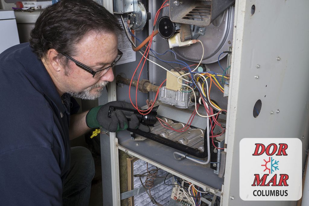 Columbus, Ohio - Annual furnace tuneup being performed by a certified HVAC technician